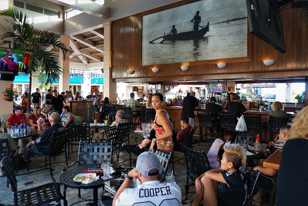 Mai Tai Bar is a popular beachfront bar in Honolulu, Hawaii, known for its tropical cocktails, live music, and stunning ocean views, creating a relaxed and enjoyable atmosphere for locals and tourists alike.