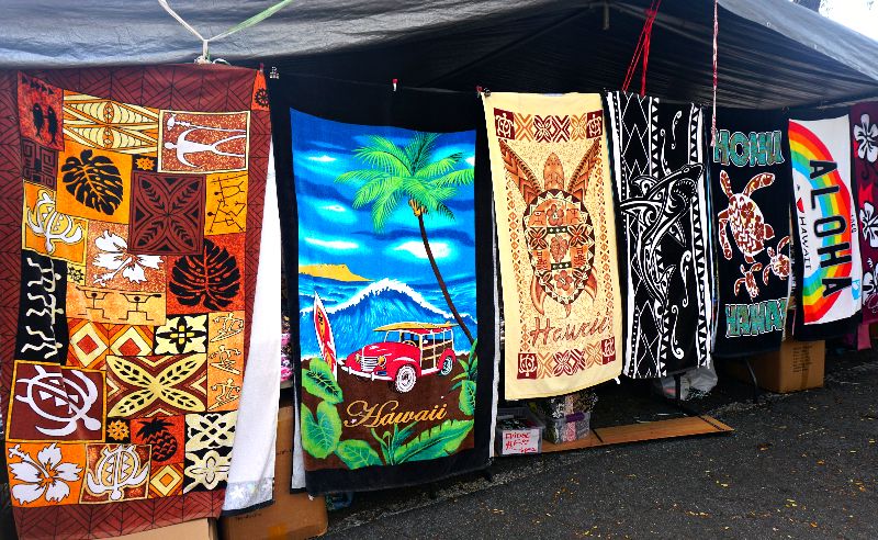 At the Aloha Stadium Swap Meet, you can find a variety of beach towels, including vibrant designs and microfiber options, perfect for enjoying a day at the beach or pool.