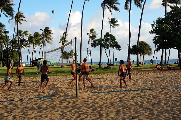 Fort Derussy Beach Park on Waikiki with people playing volleyball Fort Derussy Beach Park in Waikiki with people playing volleyball