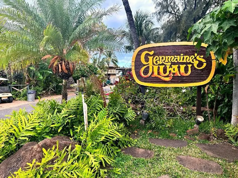 The Germaine's Luau Sign is a distinctive and welcoming marker that signifies the entrance to the renowned luau experience at Germaine's Luau in Kapolei, Hawaii.