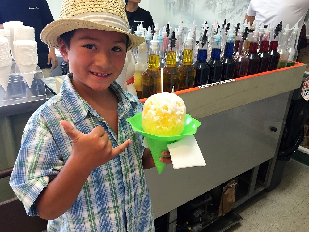Hawaiian Shave Ice Hawaiian Shave Ice is a refreshing and colorful frozen treat popular in Hawaii, made by shaving a block of ice and topping it with a variety of flavored syrups, often accompanied by sweet toppings like condensed milk and azuki beans.