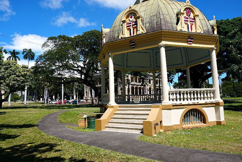 The Iolani Palace Coronation Pavilion is a graceful and picturesque structure that once served as the site of the crowning ceremony for Hawaiian monarchs, embodying the regal splendor and cultural significance of the Hawaiian Kingdom.