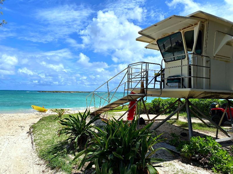 Kailua Beach Lifeguard Stand The Kailua Beach Lifeguard Stand is a vital and recognizable structure that ensures the safety of beachgoers by providing a watchful eye and prompt assistance in case of emergencies at Kailua Beach in Hawaii. 🏖️👨🚒