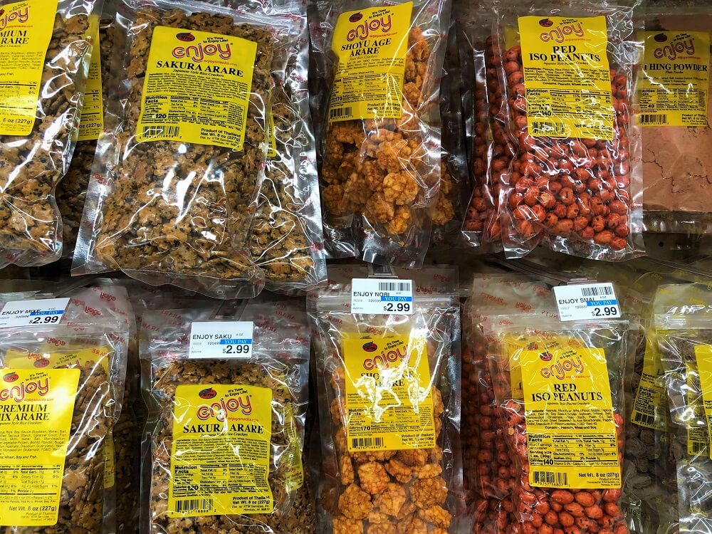 Longs Drugs Crack Seed is a traditional Hawaiian snack brand known for its flavorful and addictive preserved fruits, offering a variety of sweet, sour, and savory options that are perfect for snacking or adding to dishes for an extra burst of flavor.