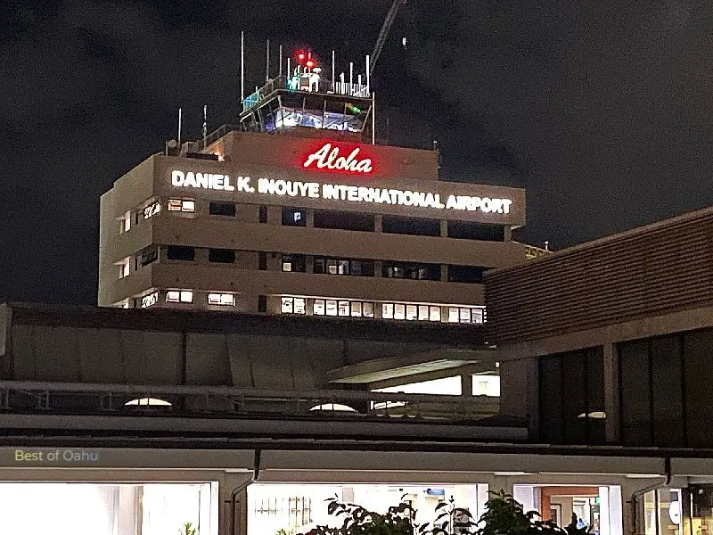 Honolulu Airport at Night with the new Daniel K. Inouye International Airport logo on the main tower building. Honolulu Airport at Night. Main building with the