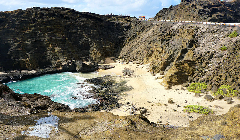 The Oahu Secret Beach is a secluded and idyllic stretch of coastline with pristine golden sands and turquoise waters, hidden away from the more popular tourist spots on the island.
