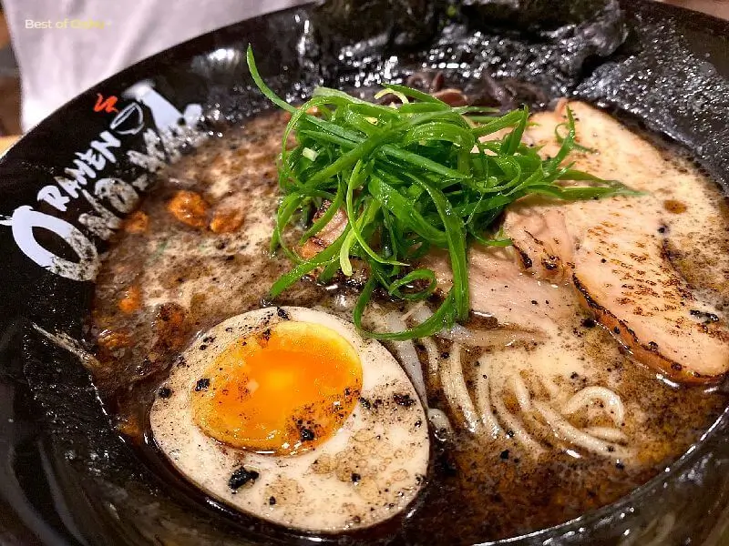 Onoya Ramen Tonkotsu Black at Onoya Ramen Restaurant is a rich and savory ramen bowl, featuring a creamy tonkotsu broth, tender chashu pork, and a perfect balance of umami flavors, creating a satisfying and indulgent dining experience.