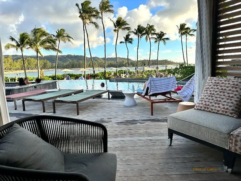 Turtle Bay Resort Pool Cabana Turtle Bay Resort Poolside Cabana, overlooking the pool, palm trees, and ocean.