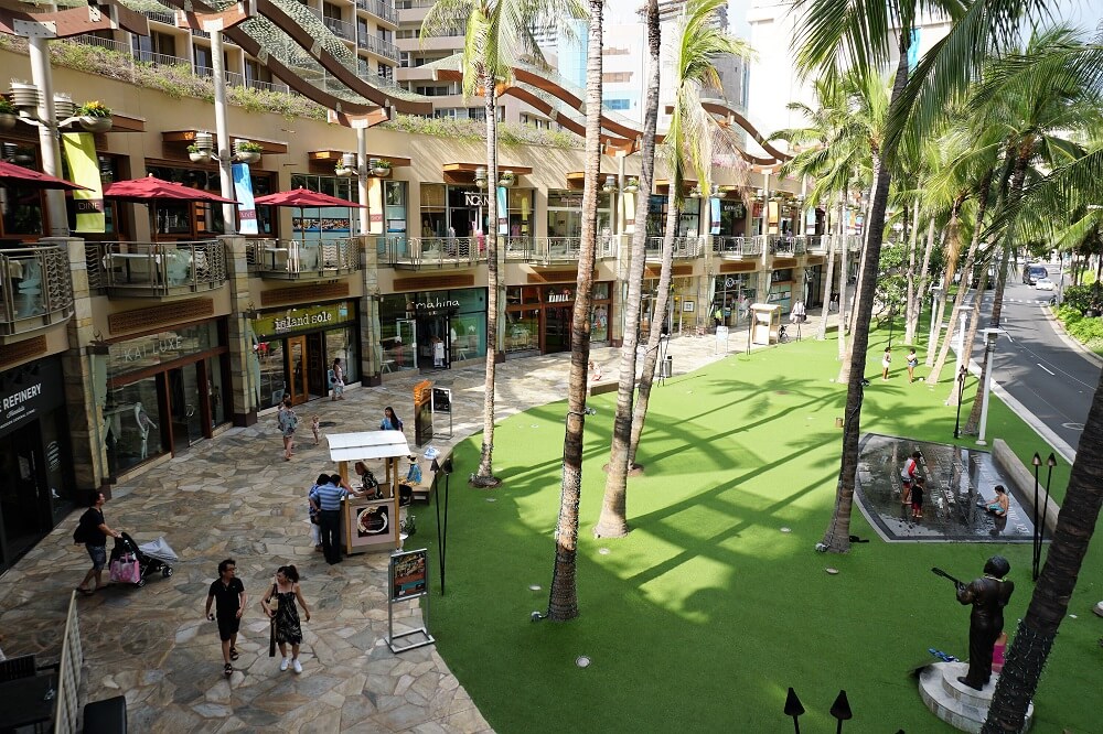 Waikiki Beach Walk is a vibrant and bustling promenade lined with shops, restaurants, and entertainment options, offering a lively and enjoyable atmosphere for visitors to soak up the sun and experience the lively spirit of Waikiki. 🏖️🛍️🍽️